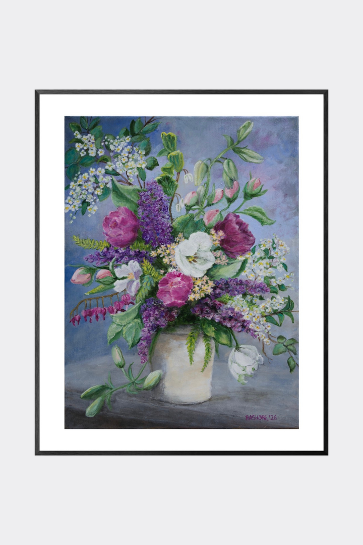 A framed floral art print featuring a bouquet of purple, pink, and white flowers in a white vase against a soft blue-gray background, shown with a white mat and black frame on a light gray backdrop.