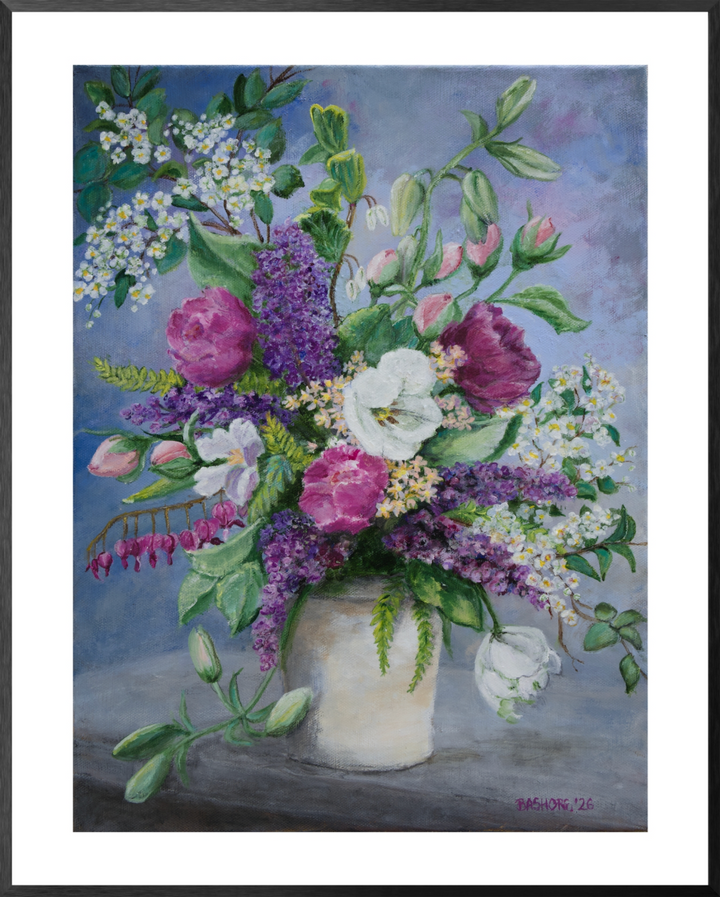 A framed still life painting of a vibrant flower bouquet in a cream-colored vase, featuring purple lilacs, pink roses, white blossoms, and green leaves against a soft blue-gray background, framed in black metal
