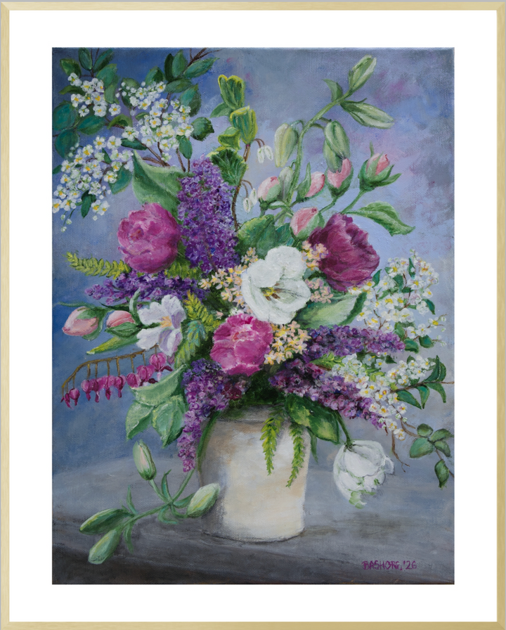 A framed painting of a vibrant floral bouquet in a white ceramic vase, featuring purple lilacs, pink roses, white blossoms, and green leaves against a soft blue-gray background, framed in gold metal.