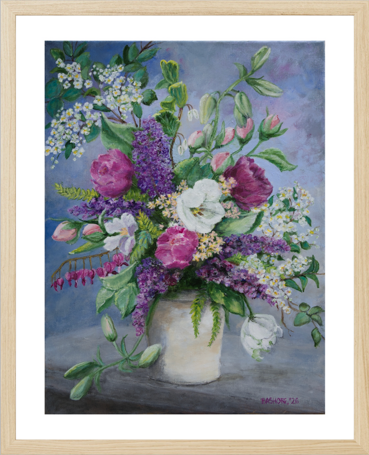 A framed still life painting of a vibrant flower bouquet in a white vase, featuring purple, pink, and white blossoms with green leaves against a soft blue-gray background, enclosed in a light wood frame.